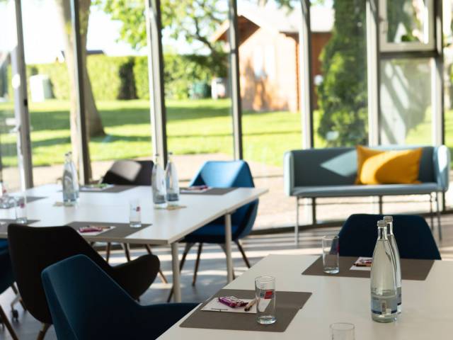 The combined Trifels and Anebos conference room, measuring 80 square meters, with direct access to the garden at Leinsweiler Hof in the Southern Palatinate.